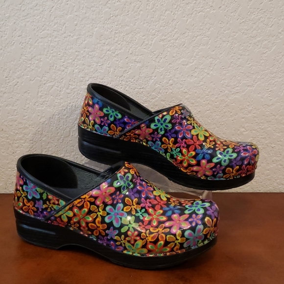 dansko floral clogs